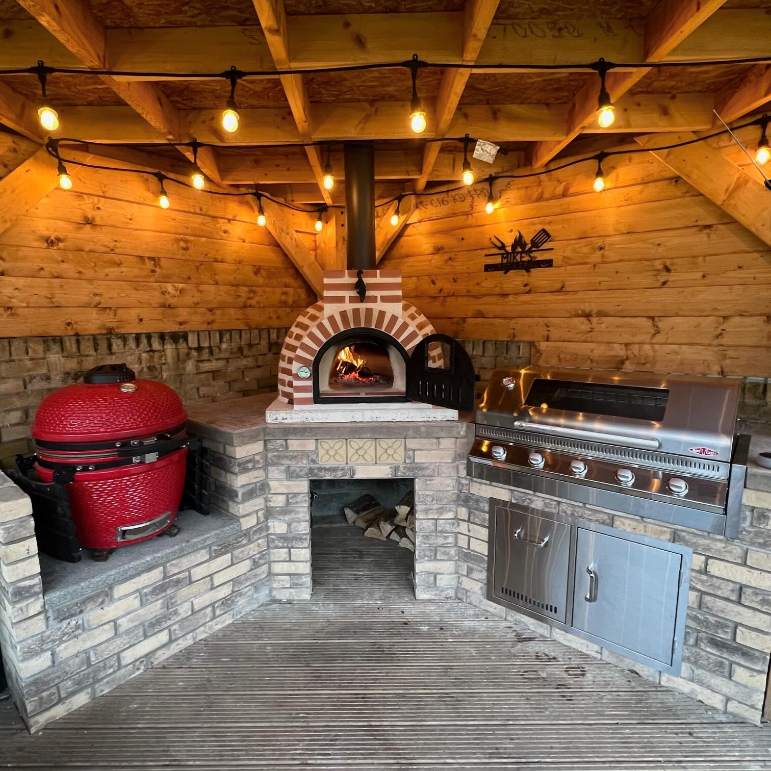 Kitchen pizza oven preparation at Bloomfield Village Pizza